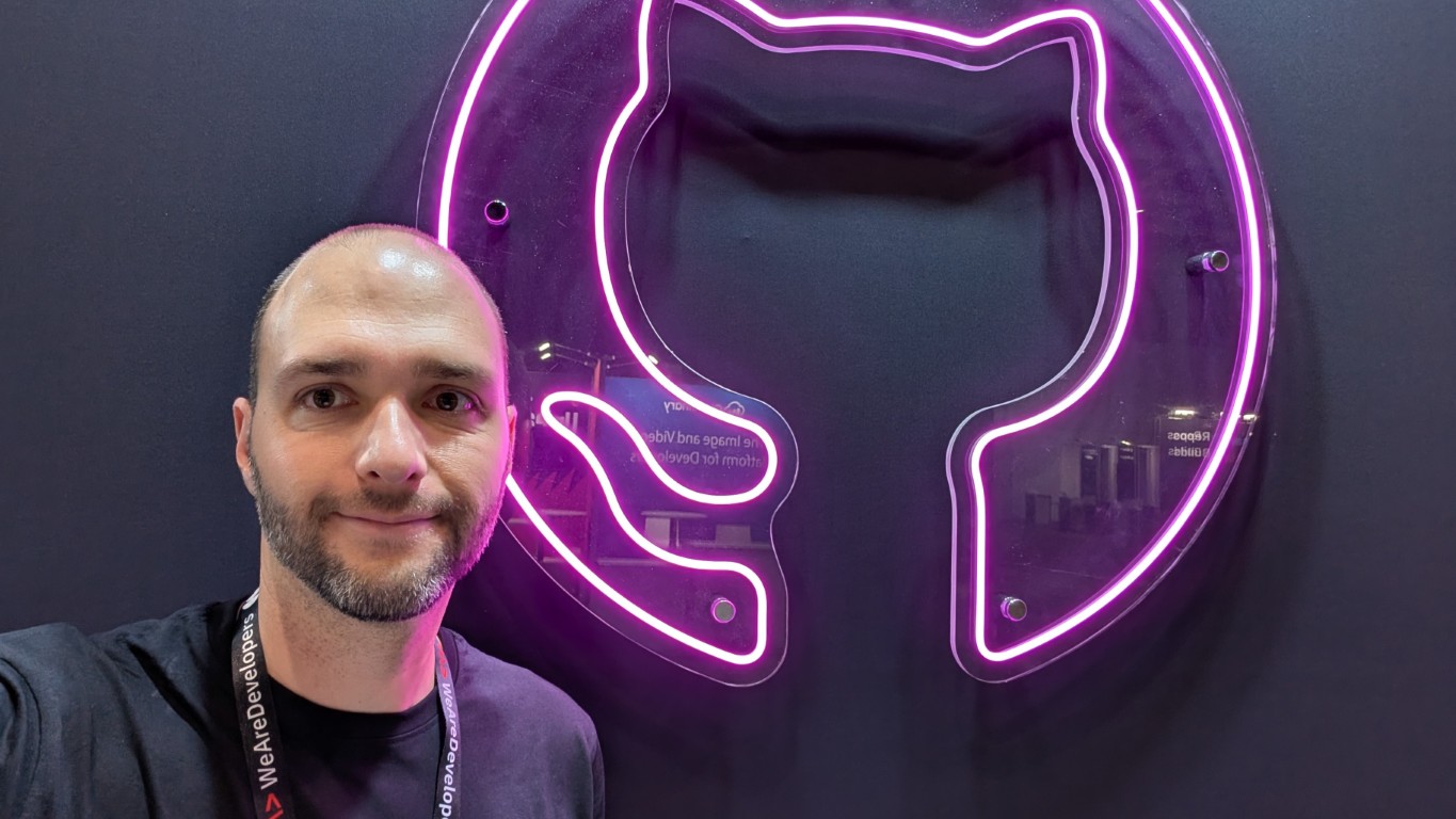 guillaume, mockoon founder in front of the github booth